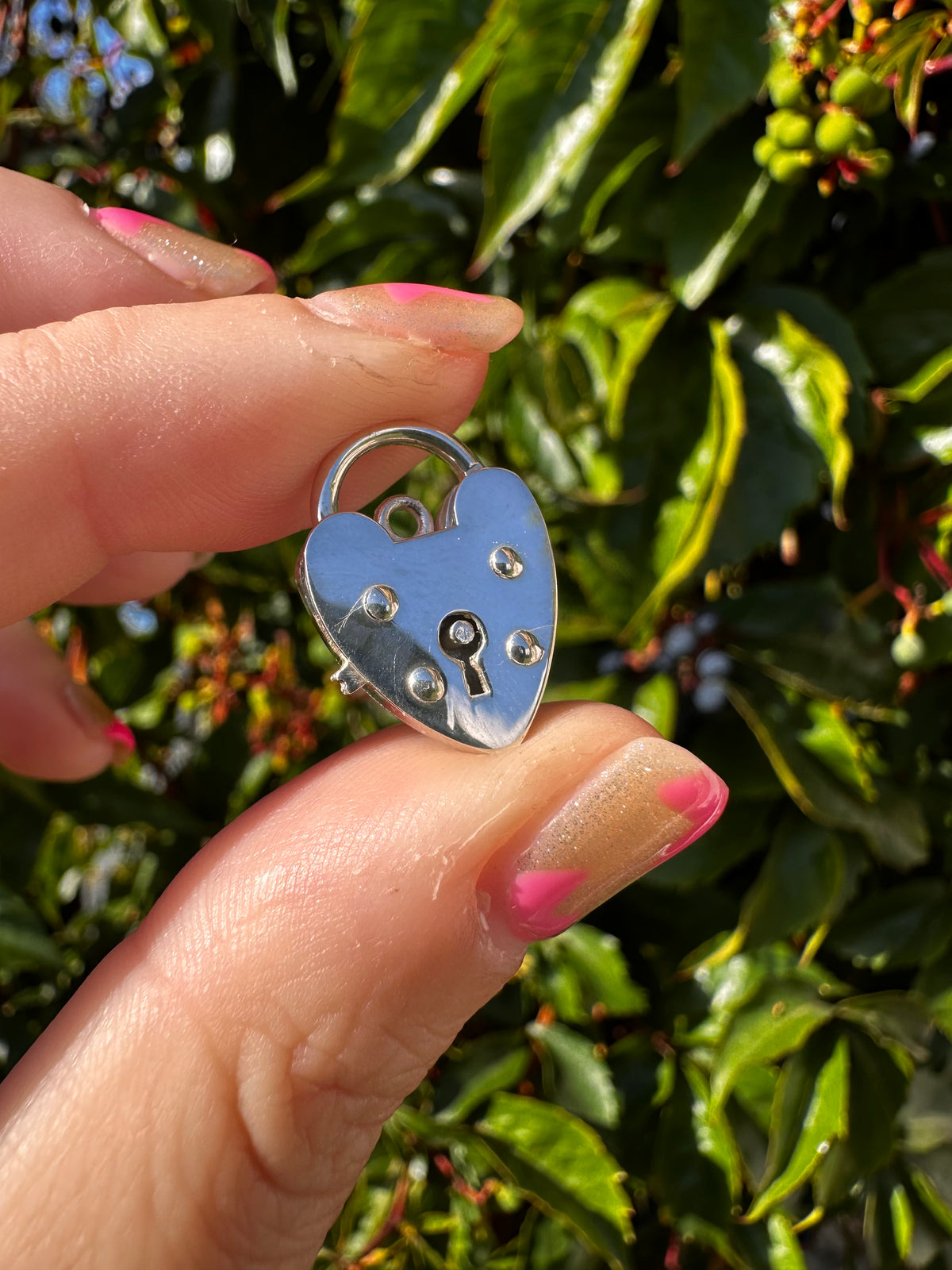 Sterling Silver Heart Padlock with lever release.