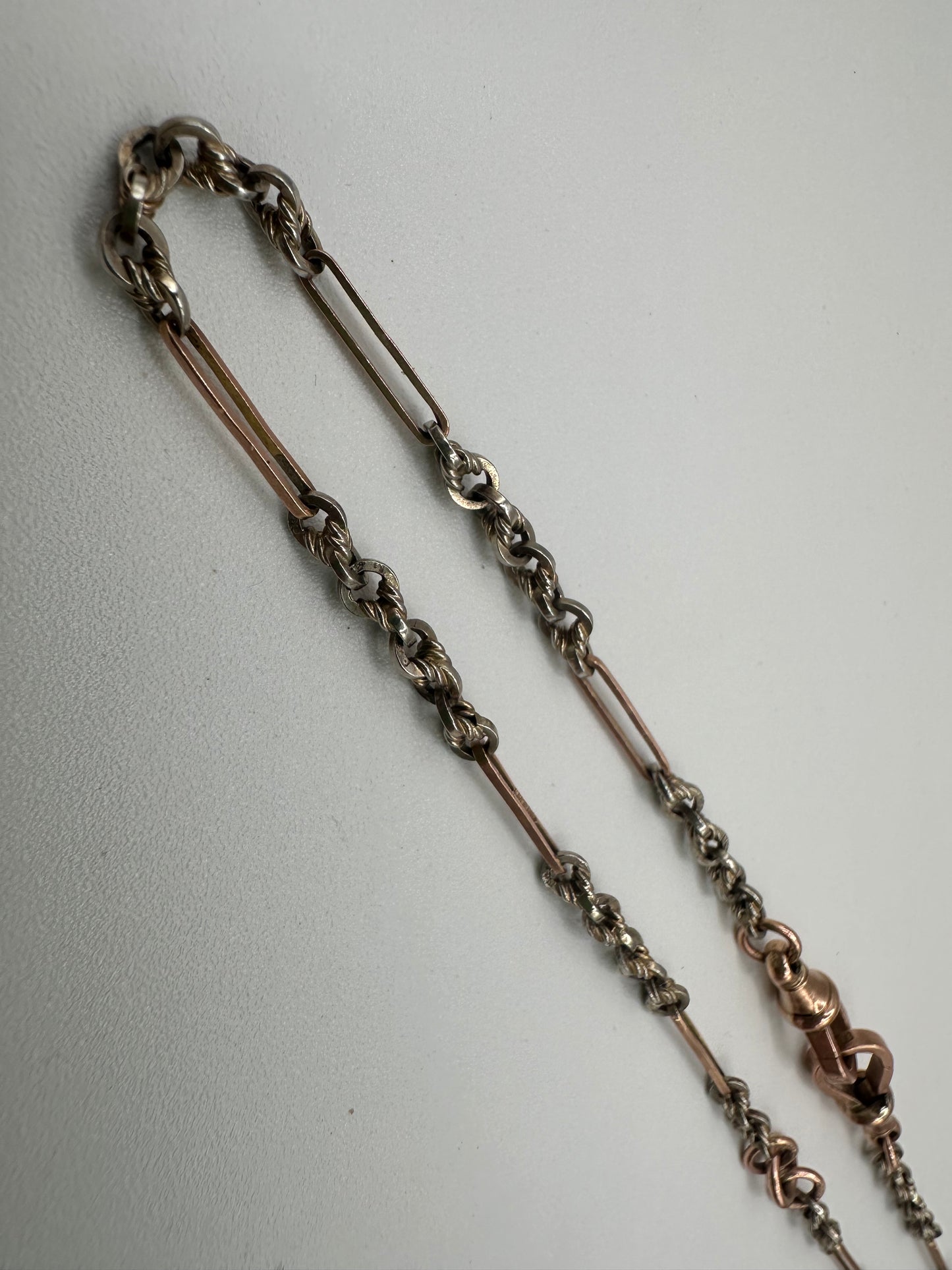 Antique 9ct Rose and White Gold Trombone and Lovers Knot chain