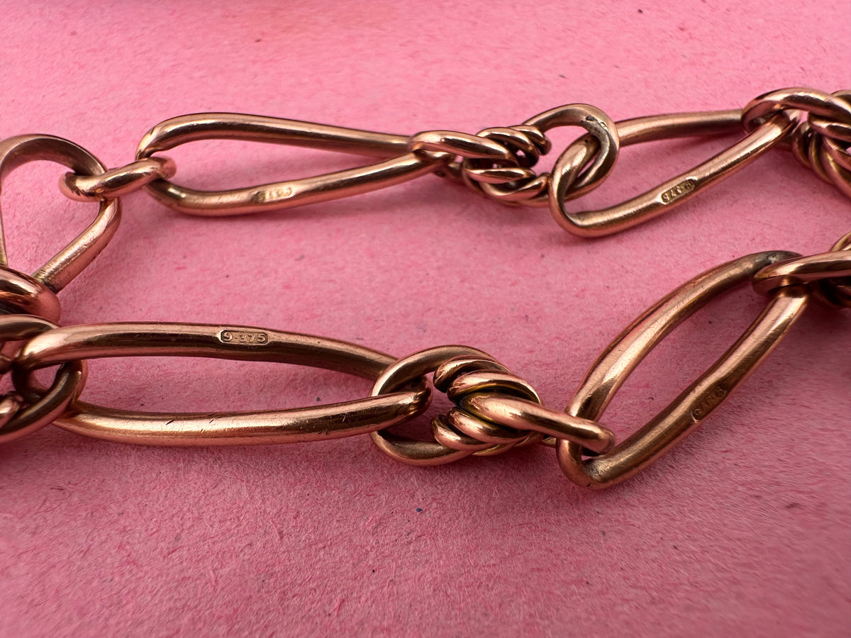 Antique 9ct Rose gold twist trombone & lovers knot bracelet with dog clip.