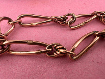 Antique 9ct Rose gold twist trombone & lovers knot bracelet with dog clip.