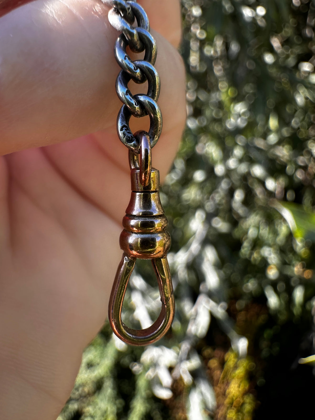 Mix metal curb extender. Sterling silver curb chain with 9ct Rose gold swivel dog clip.