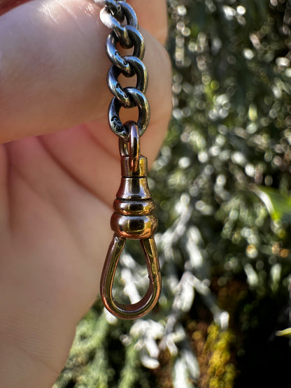Mix metal curb extender. Sterling silver curb chain with 9ct Rose gold swivel dog clip.