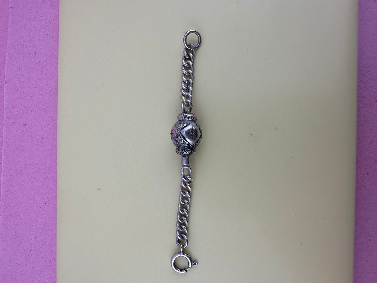 Sterling Silver Spinner Extender with spring ring clasp.