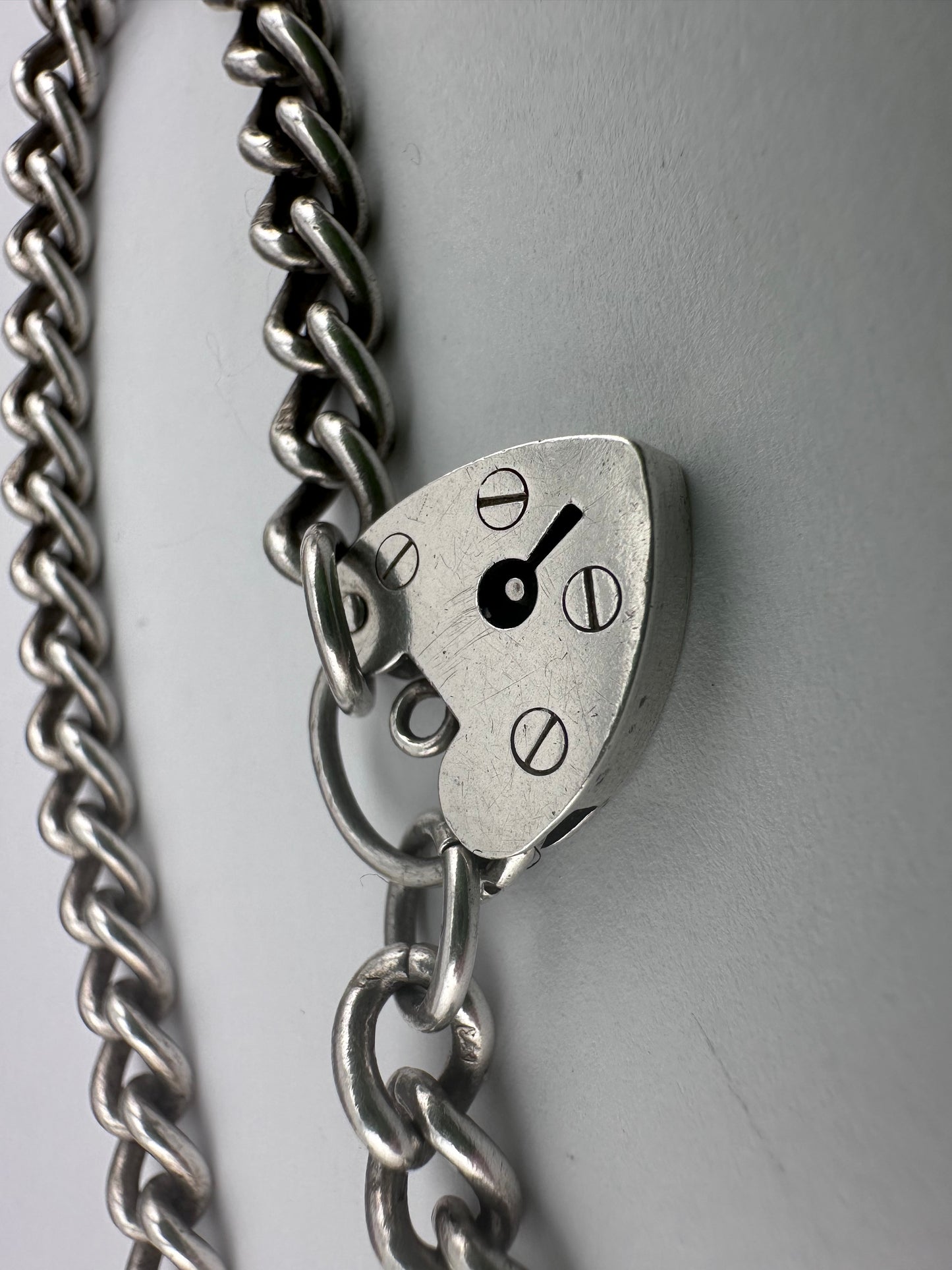Sterling Silver Curb bracelet with heart padlock