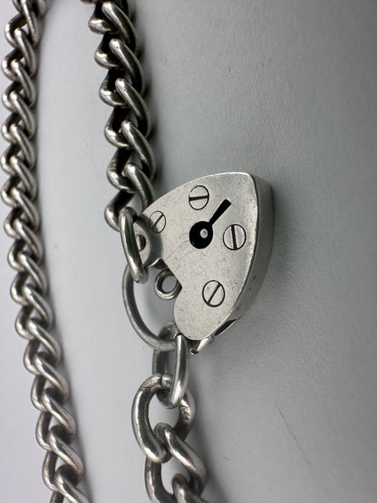 Sterling Silver Curb bracelet with heart padlock