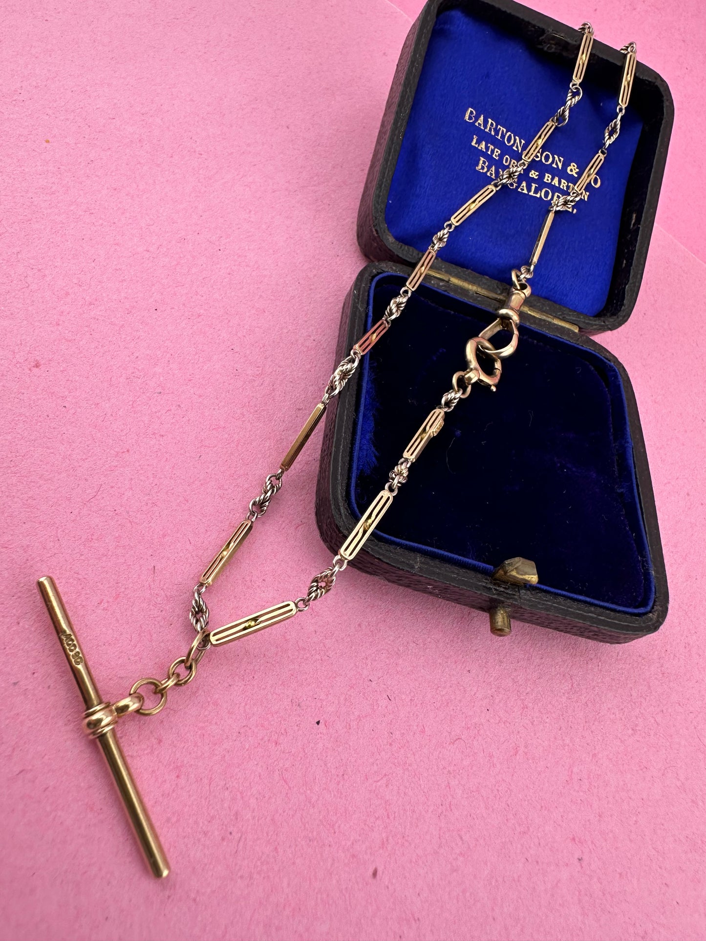 Antique 9ct bi-colour bar and lovers knot Albert chain with floating t-bar, dog clip and bolt clasp