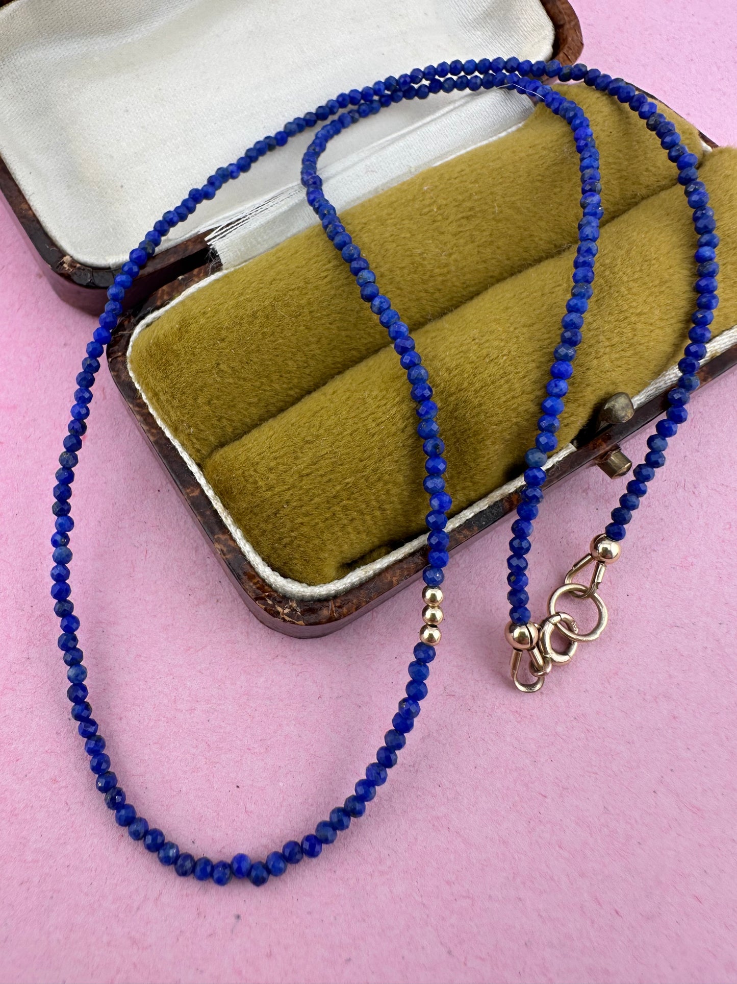 Azure- Lapis Lazuli Mini beaded necklace with asymmetrical design with 9ct antique bolt clasp.