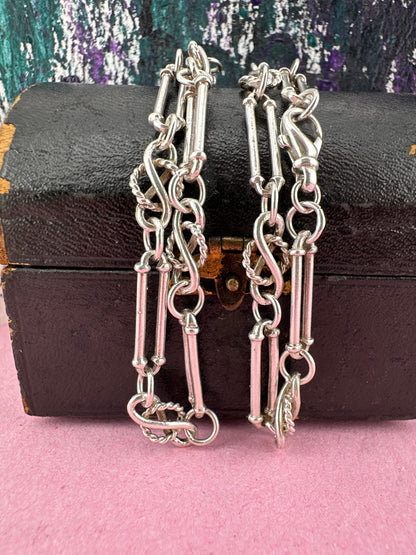 Sterling Silver Trombone with Celtic knot chain