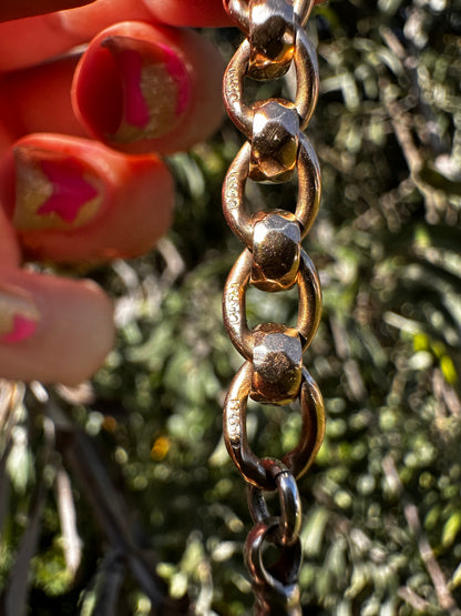 Mix metal extender. 9ct Yellow gold roller ball with sterling silver dog clip.