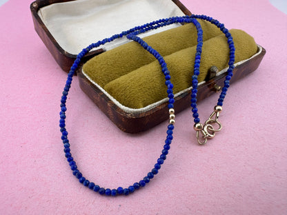 Azure- Lapis Lazuli Mini beaded necklace with asymmetrical design with 9ct antique bolt clasp.