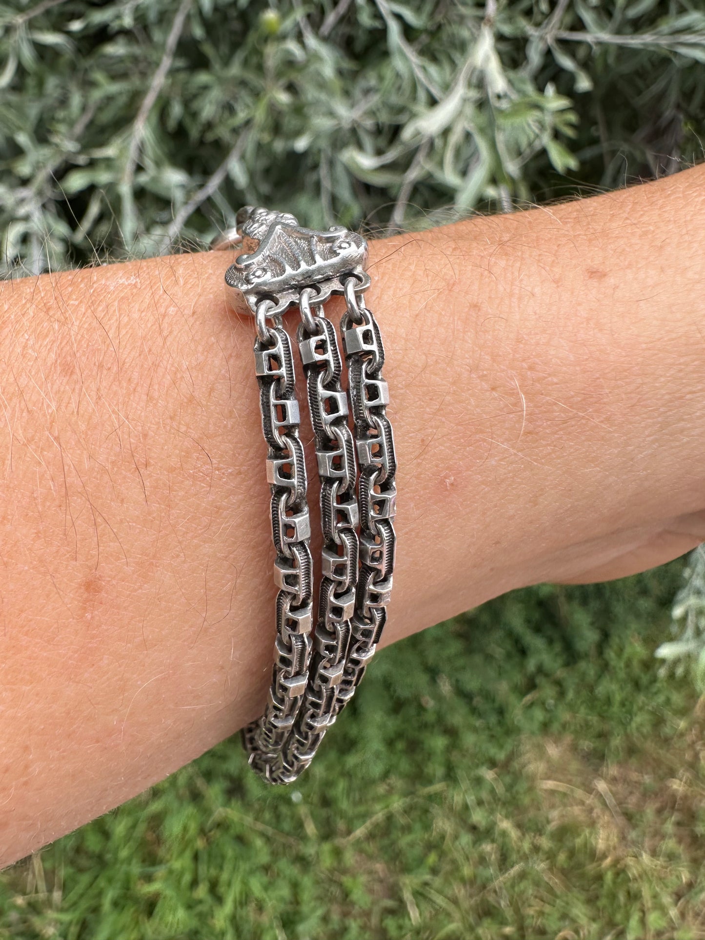 Antique Sterling Silver triple stranded fancy mariner with ornate finials bracelet.