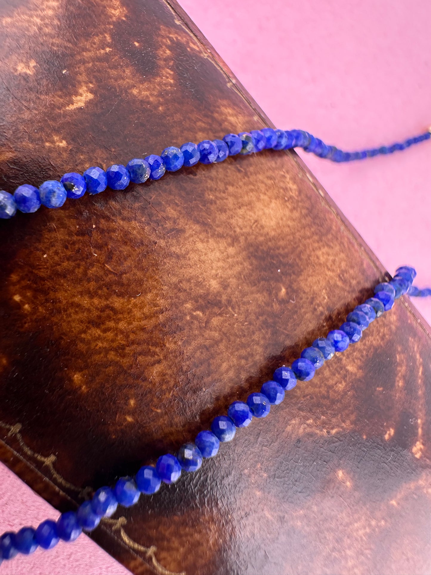 Azure- Lapis Lazuli Mini beaded necklace with asymmetrical design with 9ct antique bolt clasp.