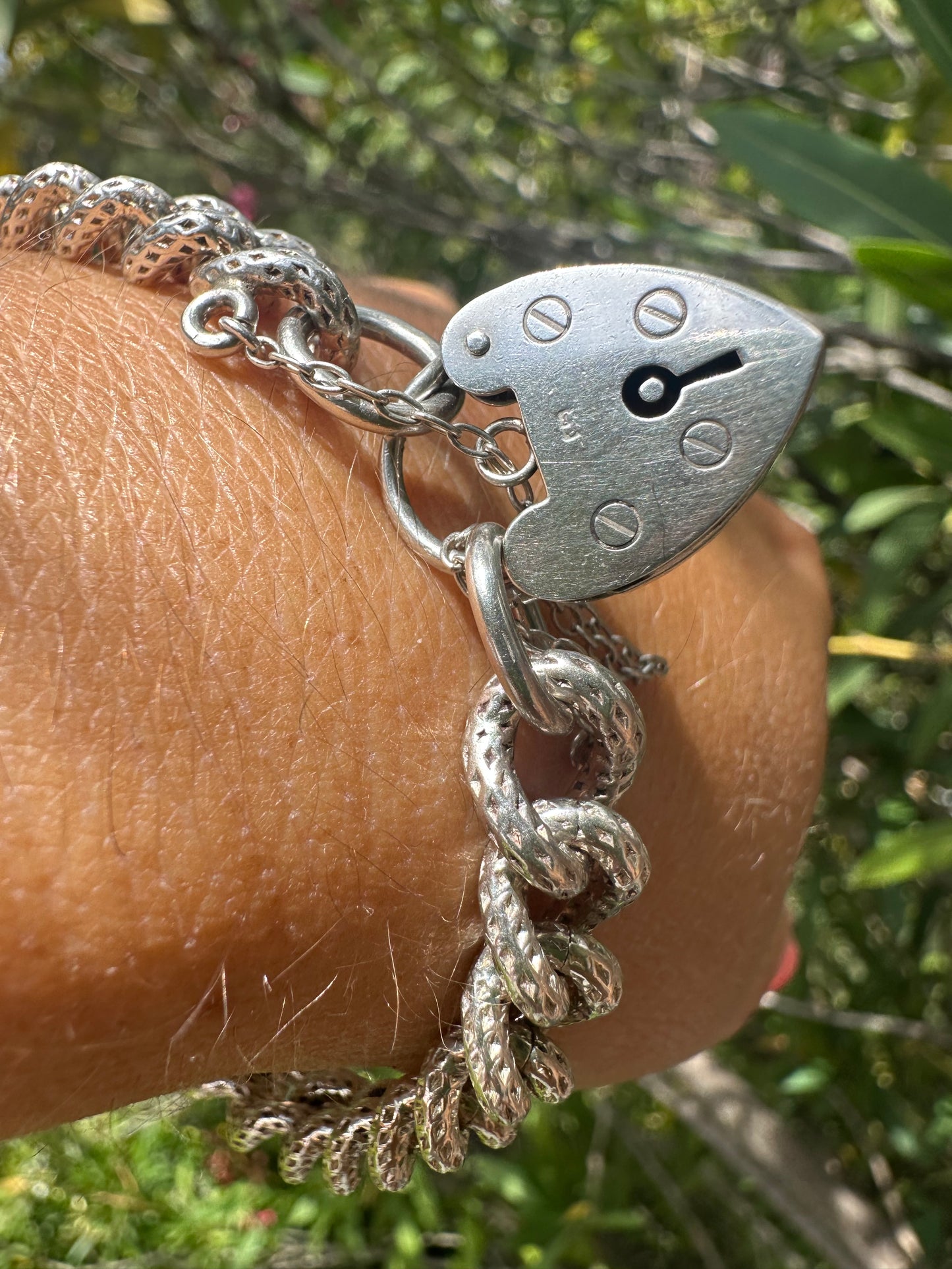 Sterling silver textured chunky curb bracelet with heart padlock