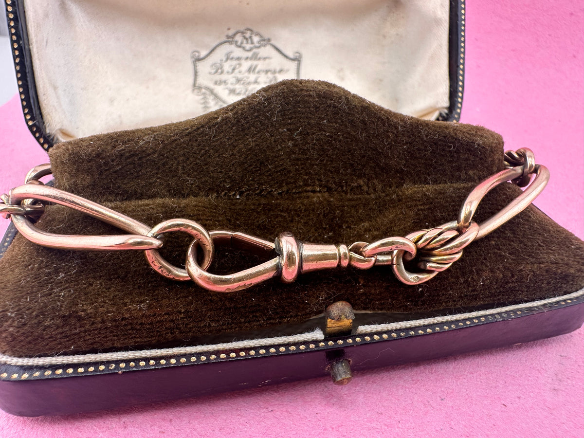 Antique 9ct Rose gold twist trombone & lovers knot bracelet with dog clip.