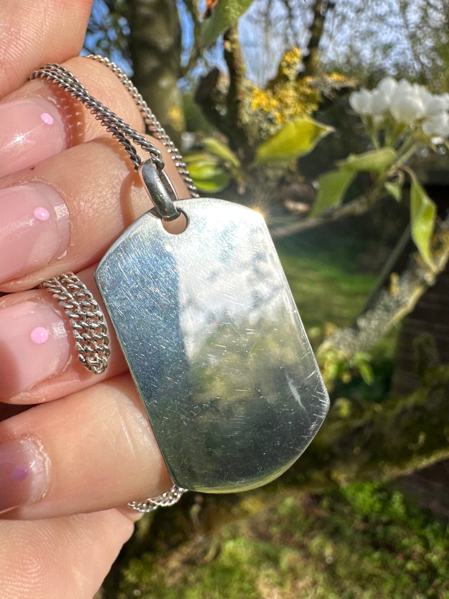 Silver Goldie Nameplate pendant on a curb chain