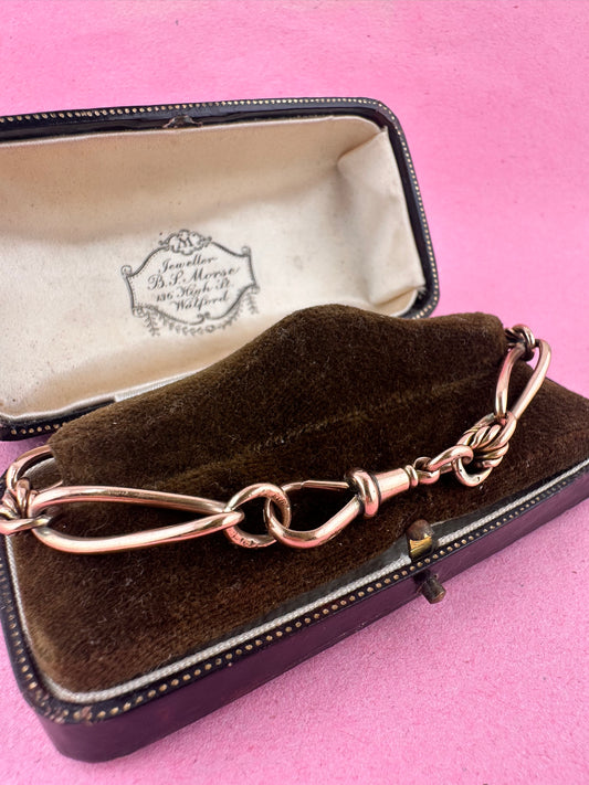 Antique 9ct Rose gold twist trombone & lovers knot bracelet with dog clip.