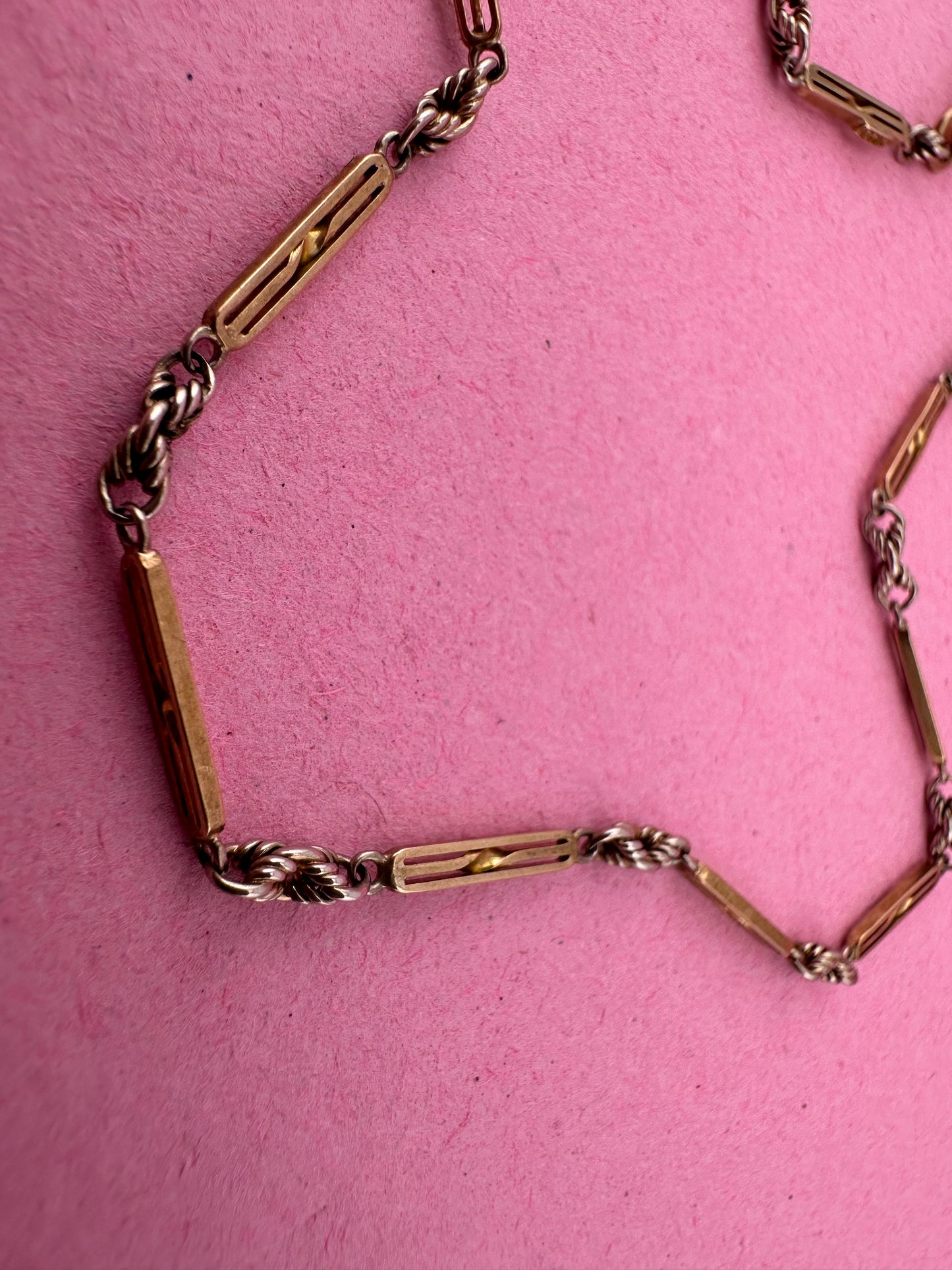 Antique 9ct bi-colour bar and lovers knot Albert chain with floating t-bar, dog clip and bolt clasp