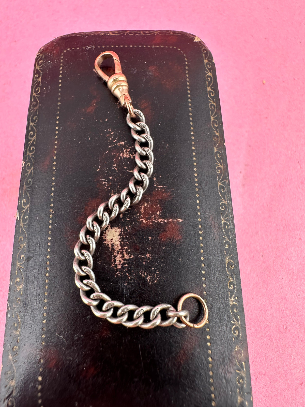 Mix metal curb extender. Sterling silver curb chain with 9ct Rose gold swivel dog clip.