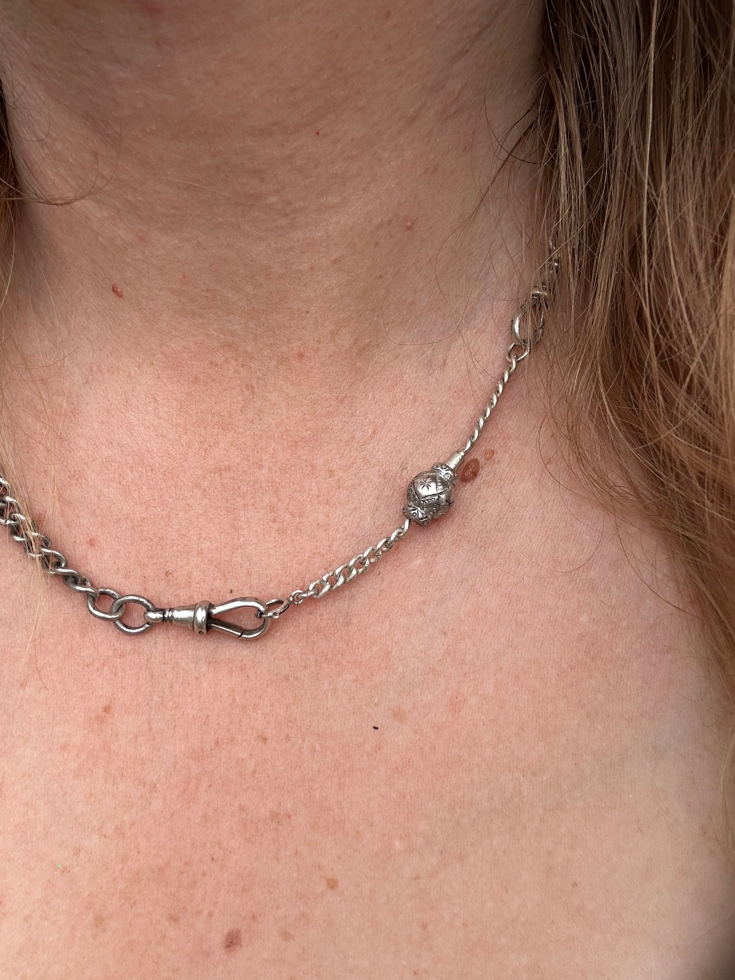 Sterling Silver Spinner Extender with spring ring clasp.