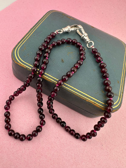 Re-imagined Vintage Garnet Beads with Vintage Sterling silver Dog clips
