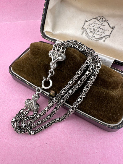 Antique Sterling Silver triple stranded fancy mariner with ornate finials bracelet.