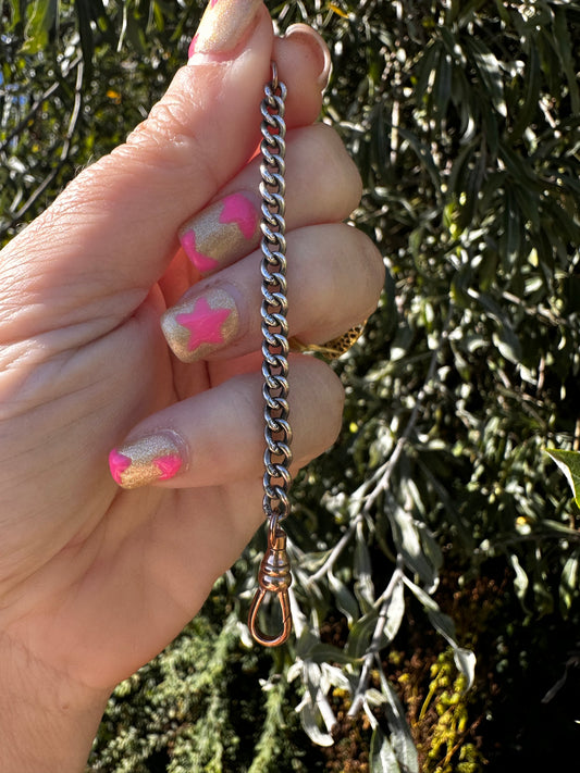 Mix metal curb extender. Sterling silver curb chain with 9ct Rose gold swivel dog clip.