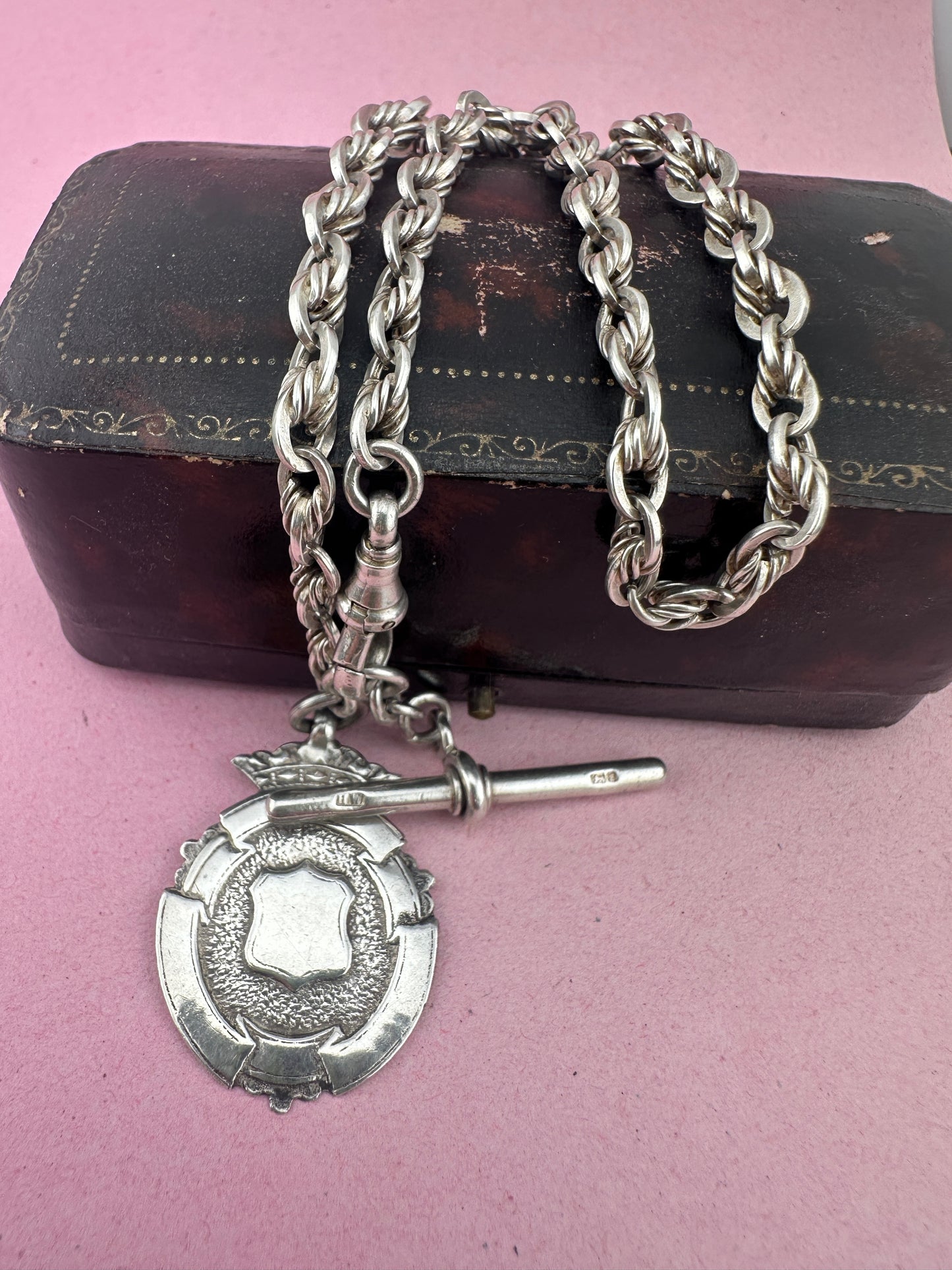 Sterling Silver Lovers Knot Albert chain, with T-bar, dogclip and shield fob.
