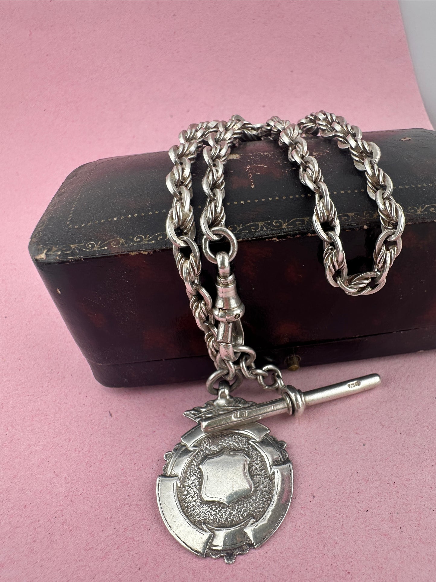 Sterling Silver Lovers Knot Albert chain, with T-bar, dogclip and shield fob.