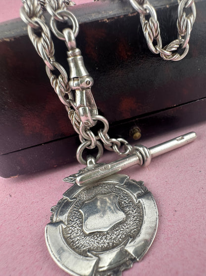 Sterling Silver Lovers Knot Albert chain, with T-bar, dogclip and shield fob.