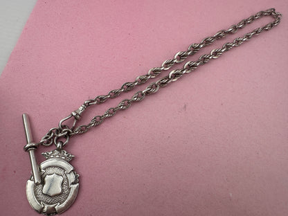 Sterling Silver Lovers Knot Albert chain, with T-bar, dogclip and shield fob.
