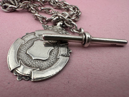 Sterling Silver Lovers Knot Albert chain, with T-bar, dogclip and shield fob.