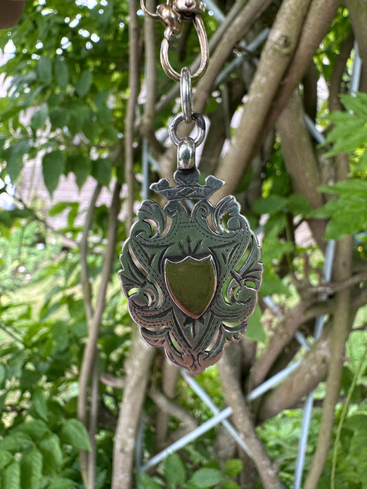 Antique Sterling silver Shield fob with rose gold centre
