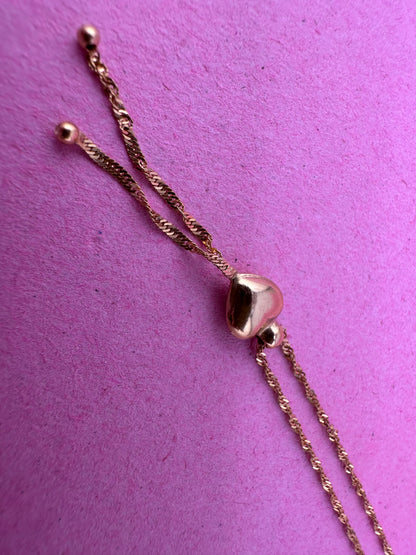 Vintage 9ct Gold Loose Rope chain with heart tassel slider.