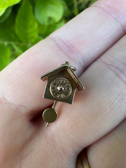 9ct Gold Articulated Cuckoo Clock with moving pendulum