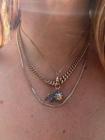 9ct Gold Evil eye charm with turquoise. Engraved with Turkish mosque.