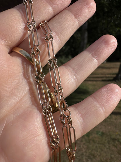 Antique 9ct Rose Gold mini trombone and lovers knot chain
