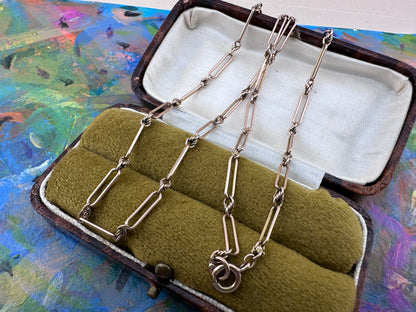 Antique 9ct Rose Gold mini trombone and lovers knot chain