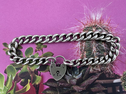 Antique Sterling silver graduated curb bracelet with vintage heart padlock clasp