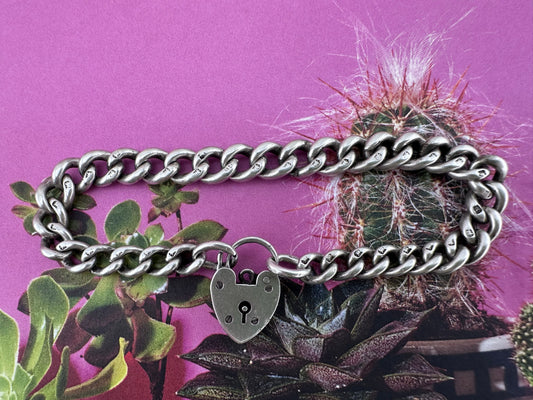 Antique Sterling silver graduated curb bracelet with vintage heart padlock clasp