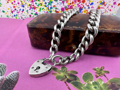 Antique Sterling silver graduated curb bracelet with vintage heart padlock clasp