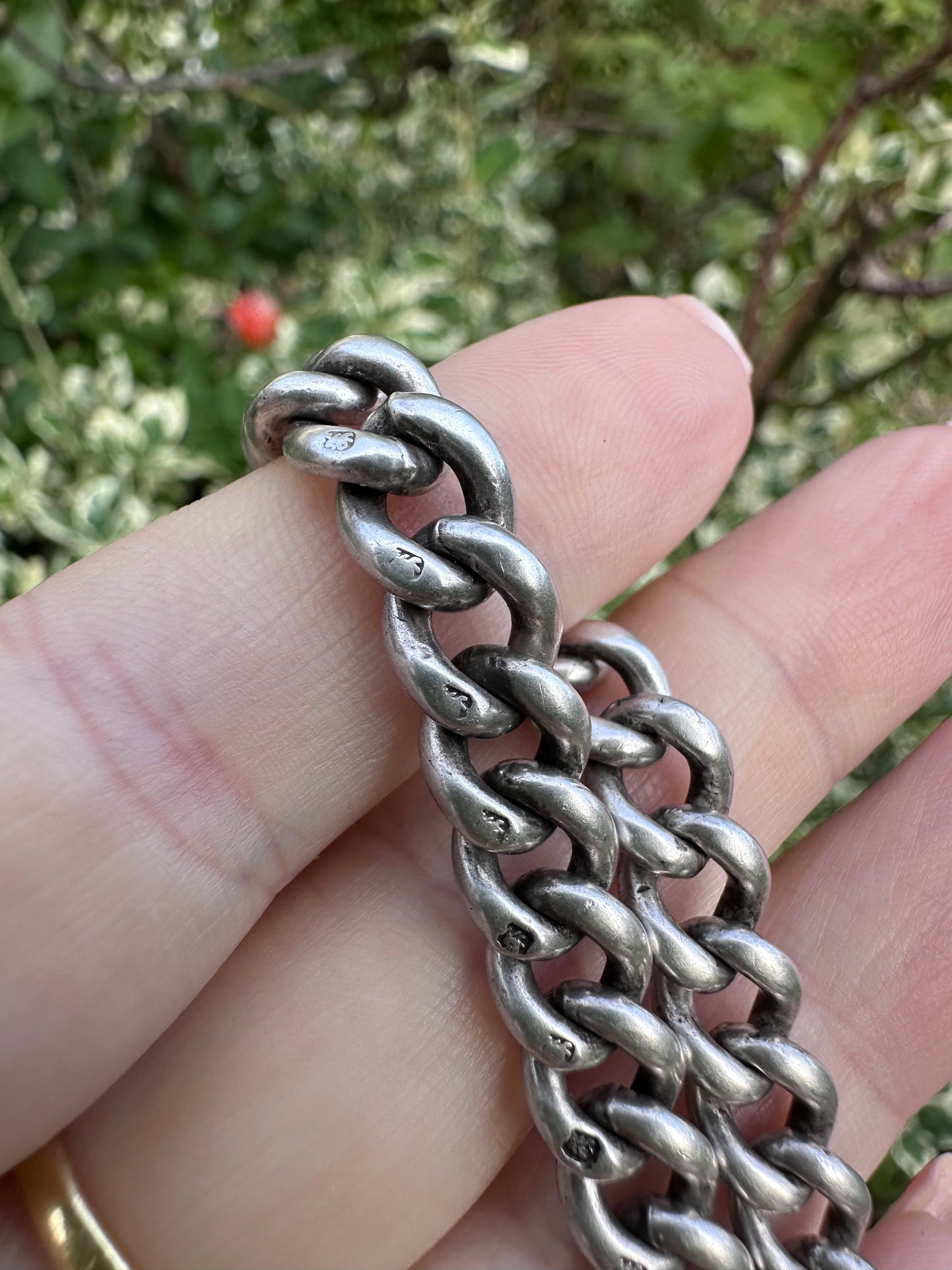 Antique Sterling silver graduated curb bracelet with vintage heart padlock clasp
