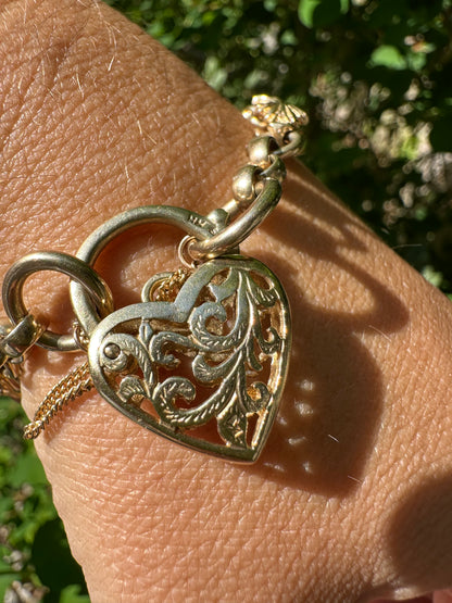9ct Yellow Gold Rolo & Leaf link bracelet with heart padlock