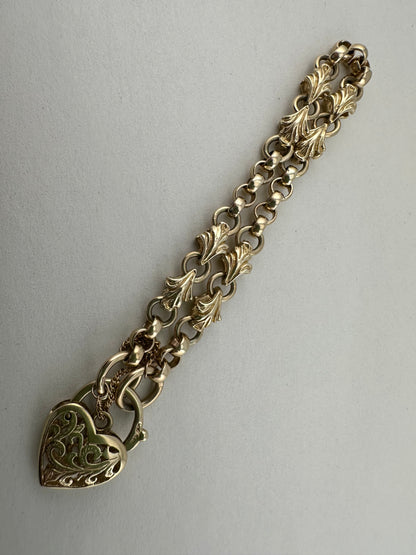 9ct Yellow Gold Rolo & Leaf link bracelet with heart padlock