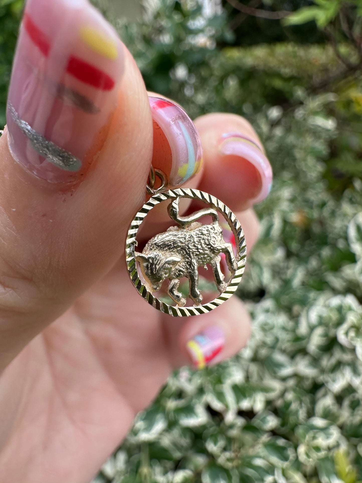 9ct Taurus Charm with engine turned frame