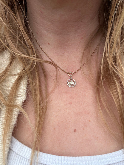 9ct Taurus Charm with engine turned frame