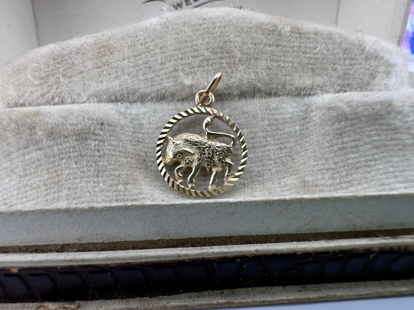 9ct Taurus Charm with engine turned frame