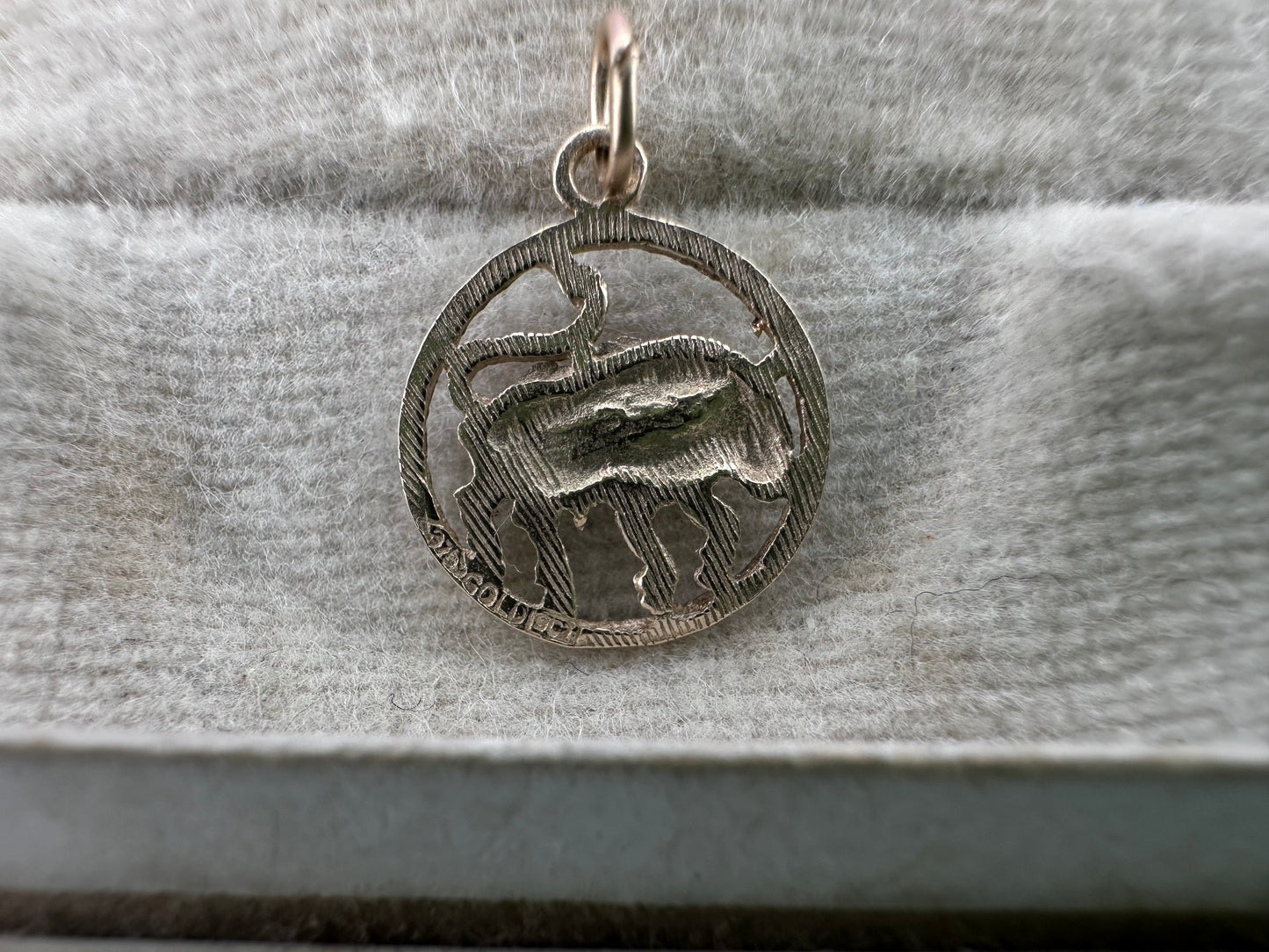 9ct Taurus Charm with engine turned frame