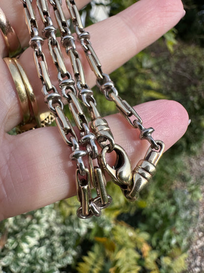 Vintage 9ct white and yellow gold double trombone and infinity link chain