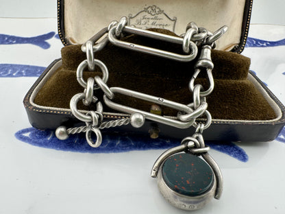 Antique Sterling Silver Trombone Albert chain with fob, 1886