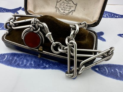 Antique Sterling Silver Trombone Albert chain with fob, 1886